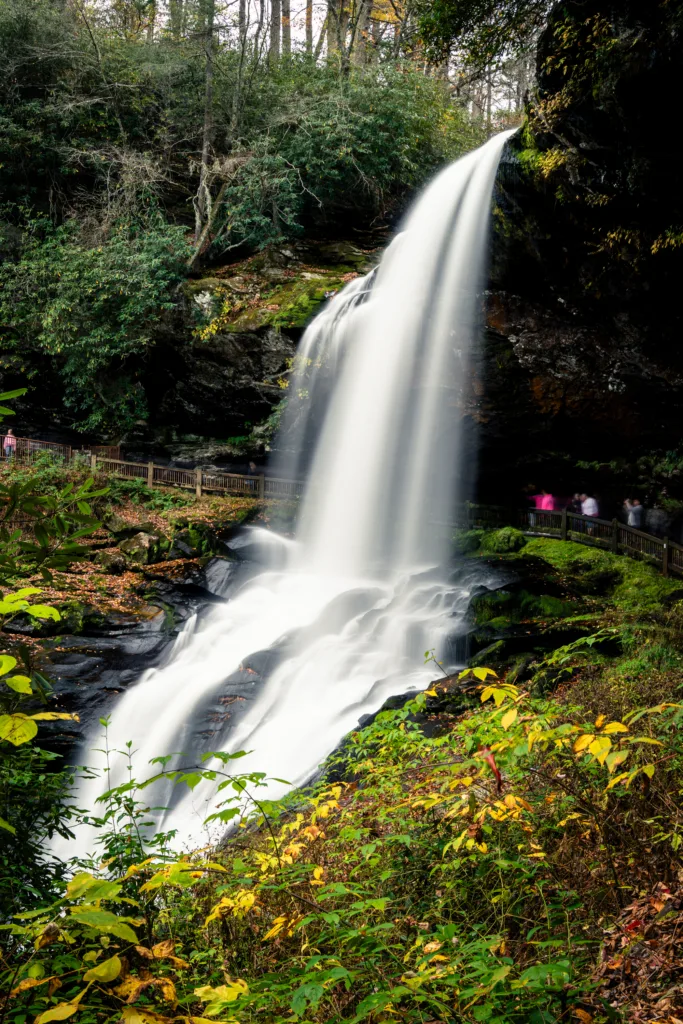 Silky Dry Falls waterfall flowing through autumn foliage near Highlands NC