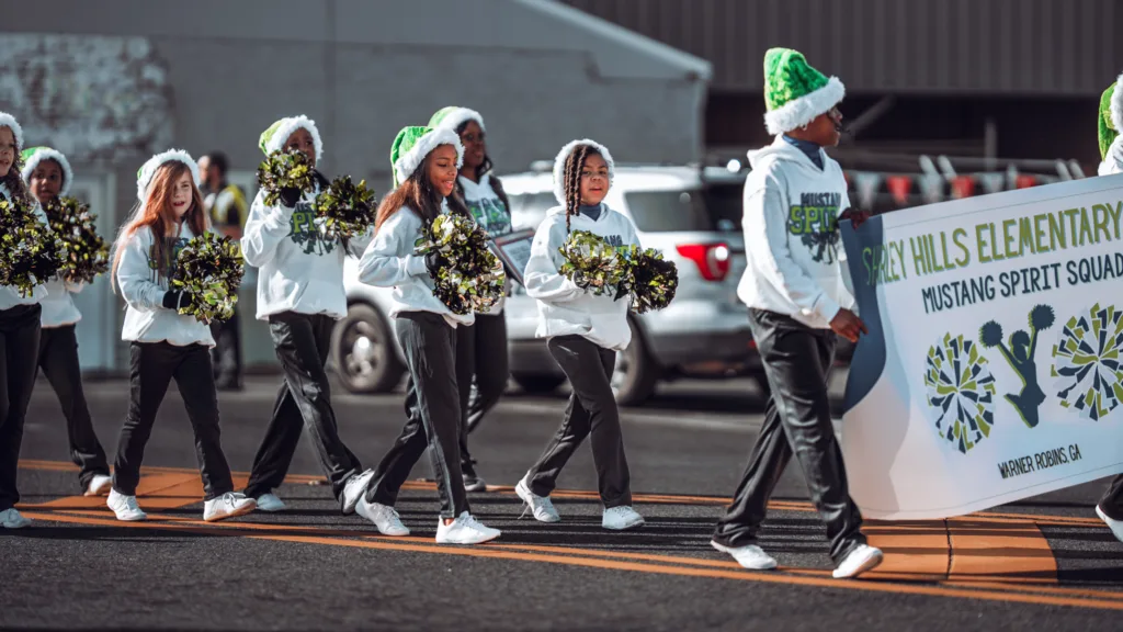 Valley Hills Elementary Mustang Spirit Squad marching in a parade