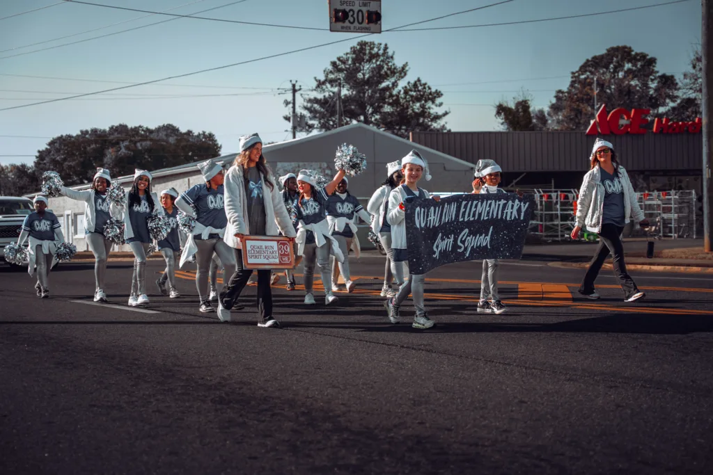 Quanah Elementary spirit squad students marching in a street parade